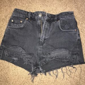 Ripped-Moto Mom style black high waisted shorts
